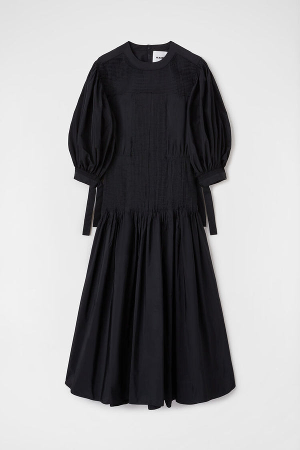 Long dress with pintucks on shoulders and skirt