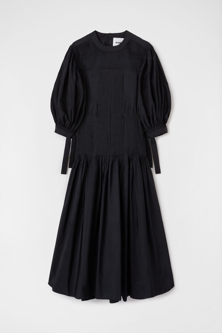 Long dress with pintucks on shoulders and skirt