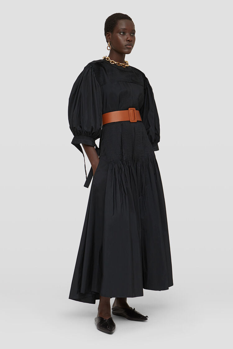 Long dress with pintucks on shoulders and skirt