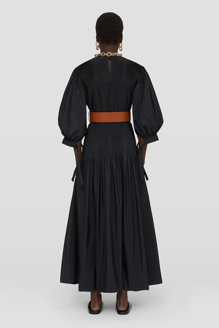 Long dress with pintucks on shoulders and skirt