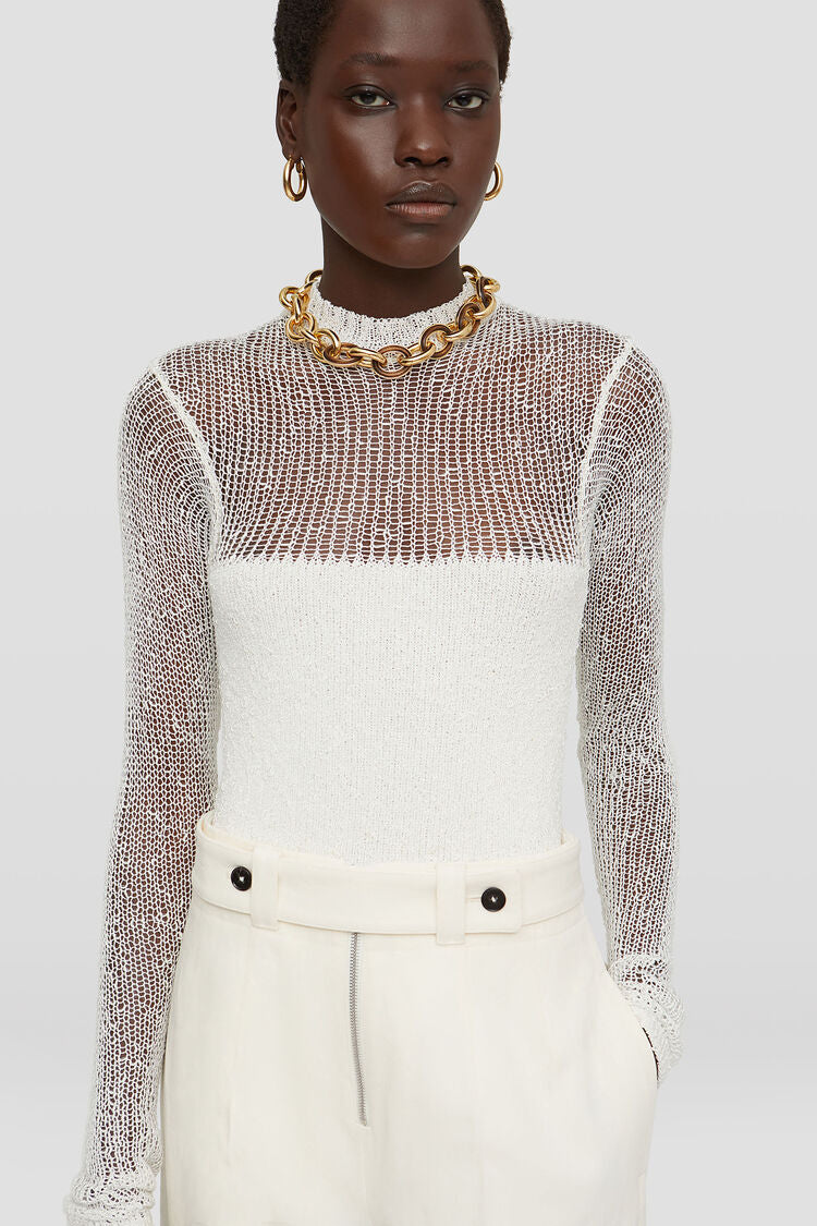 Virgin wool top with opaque block detail