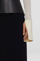 Long-sleeved sweater with off-gauge sleeve detailing