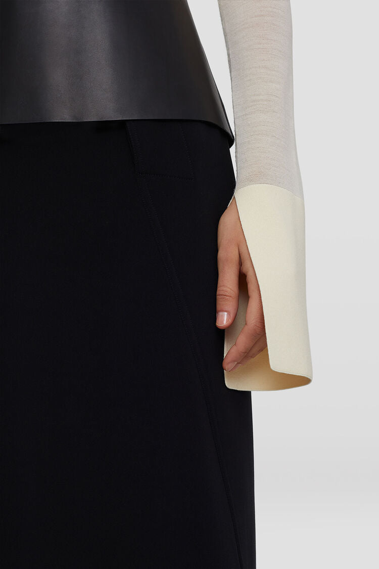 Long-sleeved sweater with off-gauge sleeve detailing